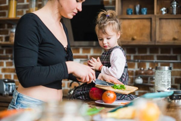 mom and baby cooking