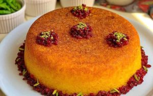 Tahchin literally means "arranged at the bottom" in Persian. It’s a rice cake with a crispy saffron-bathed base, baked with layers of protein and rice.